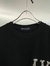 T-shirt Louis Vuitton na internet