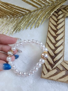 Pulseira Pérola com Toque Dourado na internet