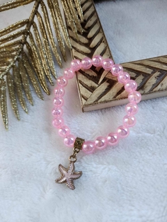 Encanto Marinho: Pulseiras em Pérolas Rosa com Pingente Estrela do Mar