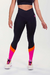 CALÇA LEGGING COM CÓS TRANSPASSADO (PRETO COM DETALHES ROSA E LARANJA)