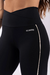 CALÇA LEGGING COM RECORTE E CÓS TRANSPASSADO (PRETO COM DETALHES ROSA CLARO E OFF-WHITE)