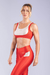TOP COM RECORTE CIRCULAR FRONTAL (VERMELHO COM DETALHES NUDE) na internet
