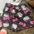 Conjunto Hello Kitty Saia Chumbo - Momi - Hello Mundo