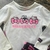 Conjunto Hello Kitty Saia Chumbo - Momi na internet