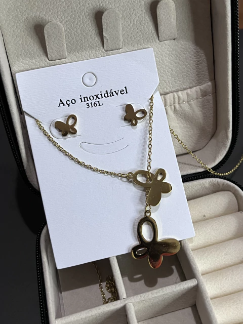 CONJUNTO EM AÇO INOX BORBOLETA TIPO GRAVATINHA COR DOURADO - comprar online