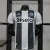 Camisa Newcastle I 25/26 - Jogador Adidas Masculina - Preta e branca - comprar online