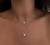 collar de doble corazón