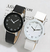 Reloj de cuarzo con correa de cuero unisex