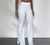calça flare meg