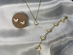 Set collar, pulsera y aretes de mariposa blanco. - comprar en línea