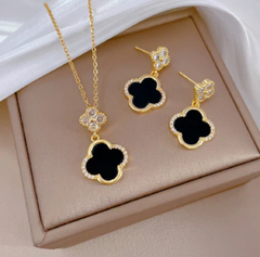 Set collar y aretes trebol negro en internet