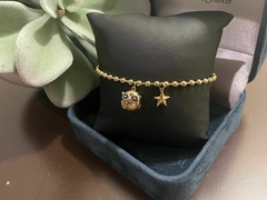 Pulsera con dijes de Búho y estrellita. - comprar en línea
