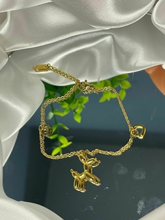 PULSERA DE PERRITO GLOBO - comprar en línea