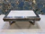 Mesa ratona marquina black con base en acero inoxidable pulido espejo - Acero Y Marmol