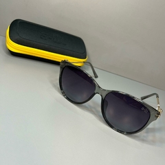 SK438-TR.81 OCULOS DE SOL REDONDO ARMACAO TRANSLUCIDA E LENTE DEGRADE