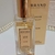 Frasco de perfume Brand Collection 177, inspirado na fragrância Chloe, com embalagem e detalhes em dourado.