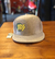 Snap back gris melange