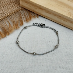 PULSEIRA RABO DE RATO COM ESFERAS ESPAÇADAS