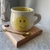 Set carita Feliz + tabla + cuchara