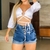 Short Jeans Feminino: Lavagem Vintage e Romântico - Pop Wear