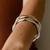 Bracelete Aros Torcidos Liso - Ouro 18k - comprar online