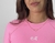 Colete rosa de manga longa com detalhe em logo no peito. Aproveite a promoção de natal e garanha presentes de natal