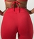 Vista traseira da calça Garnet, uma legging vermelha com cintura alta, destacando o design e o ajuste do produto. Calças em promoção na black Friday 