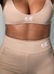Top de sutiã nude com decote em V e logo em destaque.conjunto fitness em promoção na black Friday 