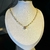 Corrente cartier 60cm detalhes zirconia rosa