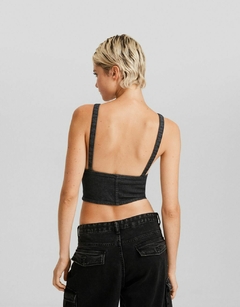 Top de Mezclilla con tiros Bershka en internet
