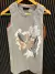 MUSCULOSA LARGA VITAMINA GRIS (E020) en internet