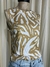 Remera s/mangas floreada