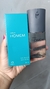 Frasco de desodorante corporal Natura Homem Spray de 100 ml, acompanhado de sua embalagem, segurado por uma mão.