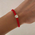 Pulsera Hilo y Dije corazon