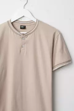 REMERA CUELLO MAO CON PUÑOS TEJIDOS en internet