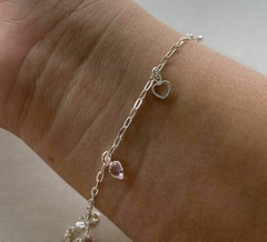 PULSEIRA DE PRATA CORAÇÃO VAZADO E ZIRCÔNIA ROSA BEBÊ.