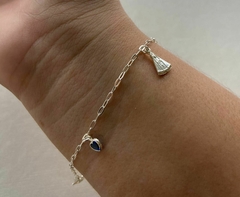 Pulseira de Prata Com pingente Nossa Senhora Aparecida e Zircônia Azul.