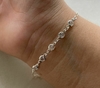 Pulseira de Prata Cinco Zircônias.