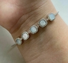 PULSEIRA DE PRATA EM MADRE PÉROLA CRAVEJADA
