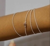 PULSEIRA BANHO DE PRATA CORDA DE VIOLÃO COM CORAÇÕES