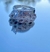 ANILLO SOLITARIO CON PIEDRAS BLANCAS EN COSTADOS # 4.5