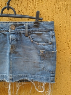 Mini Saia Jeans Retrô com Barra Desfiada Tamanho: 36 - Tio Apu Store