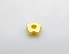 Entremeio flor maciça 5 pétalas com furo ouro - 26 gramas na internet