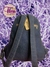 Mochila pequeña de mezclilla con bordado vertical amarillo en internet