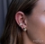 Brinco Oval P com microzircônias cravejadas em banho ouro 18k