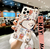 Case Snoopy holográfico con accesorios