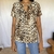 Blusa estampa onça P