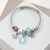 P201 Pulsera tipo pandora Margarita azul