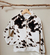 Buzo Cow con capucha