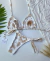 Conjunto Biquíni Cortinha C/ Calcinha Lacinho - Solar Branco/Dourado na internet